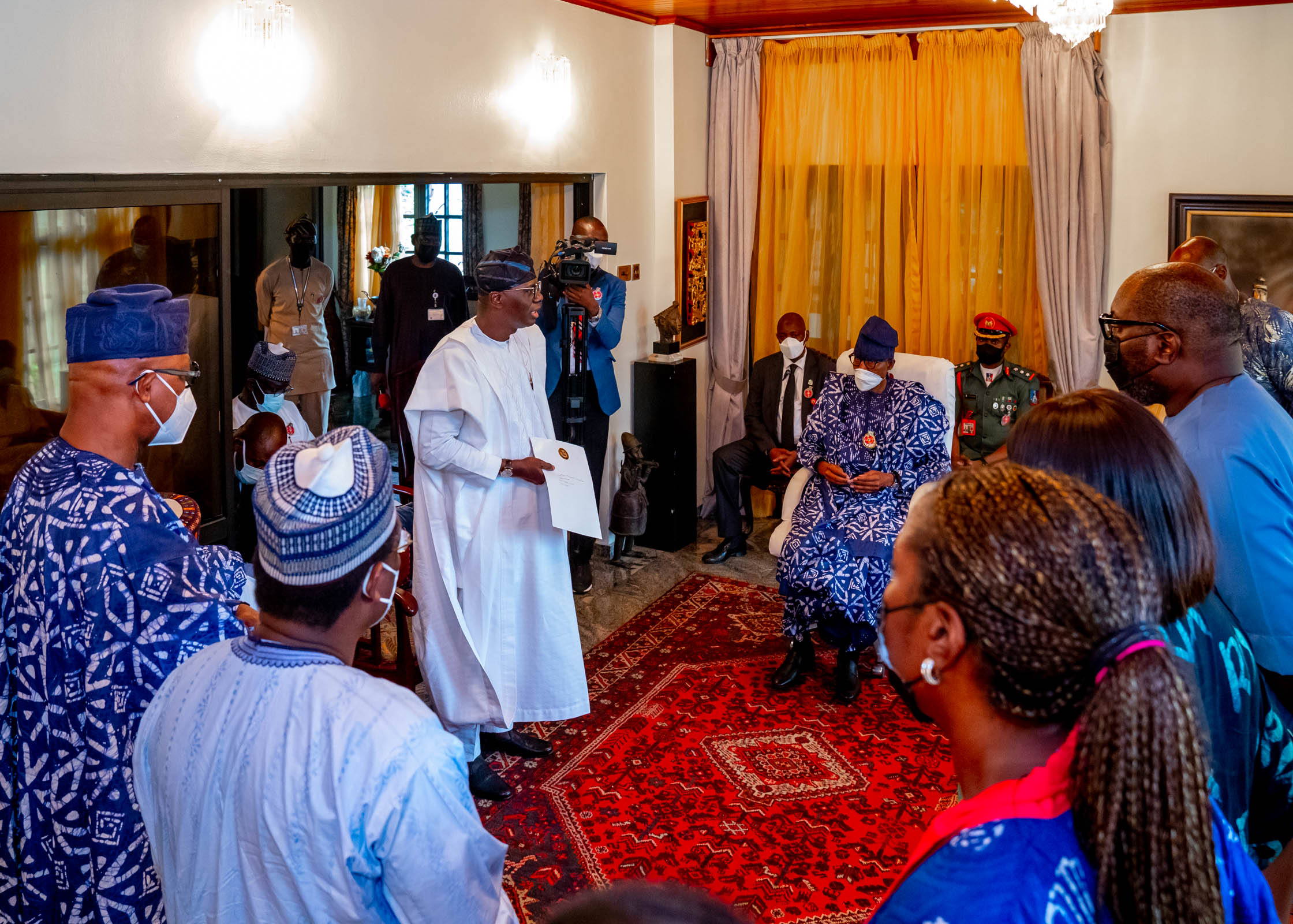 BUHARI VISITS SHONEKAN'S FAMILY IN LAGOS